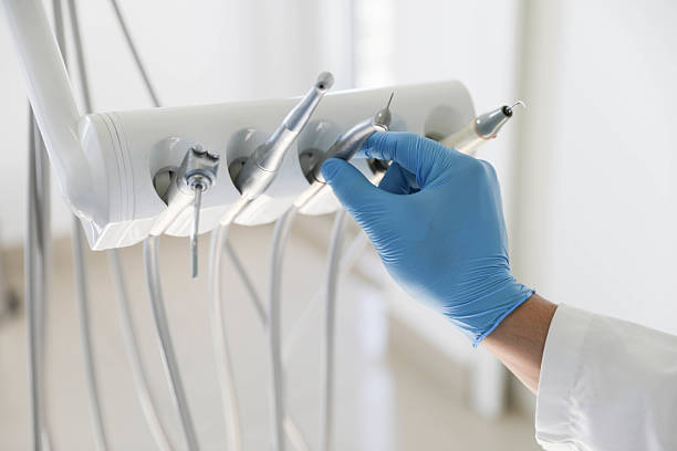 Professional Tooth Extraction technician working in Folsom, NJ